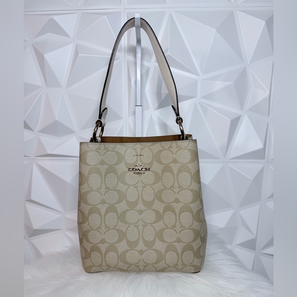 Coach Handbags - 💲Coach Beige and Cream Signature Shoulder Bag
